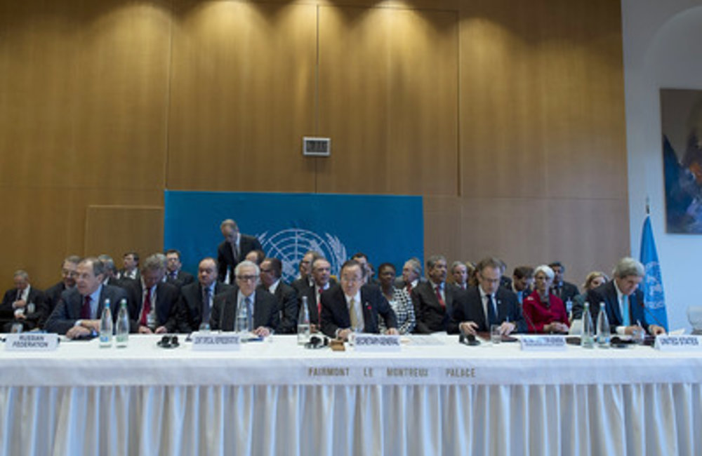 Secretary-General , Ban Ki-moon (third from left) speaks at the Geneva Conference on Syria. 22 January 2014. UN Photo / Jean-Marc Ferré